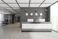 Grey office lobby with double seater front desk