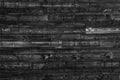 Grey Old Log Cabin Wall Texture. Wood texture. Dark Rustic House Log Wall. Horizontal Timbered Background Royalty Free Stock Photo