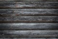 Grey old wooden log wall as a rustic background Royalty Free Stock Photo
