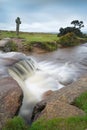 Windy Post and small waterfall. Dartmoor, Devon. Long exposure.