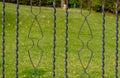 Grey painted forged metal fence. Royalty Free Stock Photo