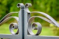 Grey painted forged metal gate. Royalty Free Stock Photo