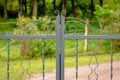 Grey painted forged metal gate. Royalty Free Stock Photo