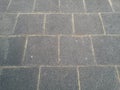 Grey paving slabs out of concrete with bright