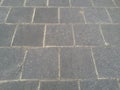 Grey paving slabs out of concrete with bright