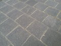 Grey paving slabs out of concrete with bright