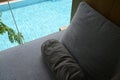 grey pillow put on bed, pool view Royalty Free Stock Photo