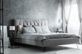 Grey pillows on king-size bed Royalty Free Stock Photo