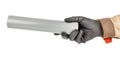 Grey plastic sewer pipe in worker hand in black protective glove and brown uniform isolated on white background Royalty Free Stock Photo