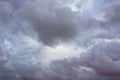 Grey purple high layered epic clouds on stormy sky