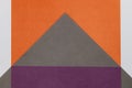 Grey, Purple and Orange coloured paper background