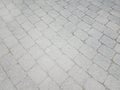 Grey rectangle tiles on the floor or ground