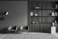 Grey relax interior with two chairs and shelf, mockup wall