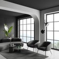 Grey relaxing interior with couch, armchairs and panoramic window Royalty Free Stock Photo