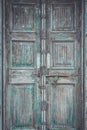 Grey retro style wooden door with rusty latch background, textur