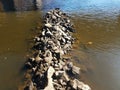 Grey rocks or stones in river water Royalty Free Stock Photo