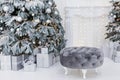 Grey round pouf near Christmas tree Royalty Free Stock Photo