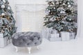 Grey round pouf near Christmas tree Royalty Free Stock Photo