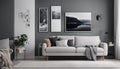 Grey settee near white cupboard in minimal living room interior with posters on the wall Royalty Free Stock Photo