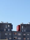 Grey simplistic lines of modern buildings against the clear sky. Modern architecture. Minimalistic design