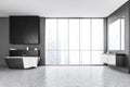 Grey sink and bathroom in a big bathroom with marble floor, windows view on the city