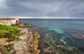 Grey sky over Alghero shoreline Royalty Free Stock Photo