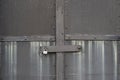 The grey steel door with padlock Royalty Free Stock Photo