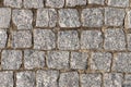 Grey stone background. Ancient stone pavement.