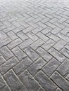 Grey Stone Pavement Texture with Herringbone Pattern Royalty Free Stock Photo