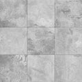 Grey stone texture pattern - patchwork tile / tiled background Royalty Free Stock Photo