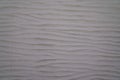 Grey striated plaster cement old ancient wall retro used gray white background