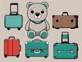 Grey teddy bear with set of suitcases