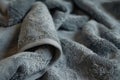 Grey textured towel fabric close-up. Macro shot with detailed fabric texture