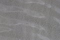 Grey textured unpainted wall plastered with cement mortar Royalty Free Stock Photo