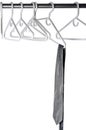 A grey tie on a clothes hanger Royalty Free Stock Photo