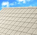 Grey tile roof of construction house with blue sky Royalty Free Stock Photo