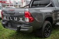 Grey toyota Hilux parked in a toyota retailer