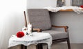 Grey upholstered chair in Halloween setting Royalty Free Stock Photo