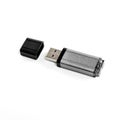 Grey usb flash drive on a white background. Royalty Free Stock Photo