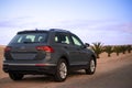 Volkswagen Tiguan against a dramatic sky