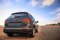 Volkswagen Tiguan against a dramatic sky