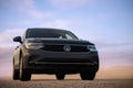 Volkswagen Tiguan against a dramatic sky