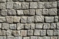 Grey wall from granite paves Royalty Free Stock Photo