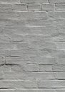 Grey wall, texture, background. The building wall, painted with whiting. Wavy and bumpy surface Royalty Free Stock Photo