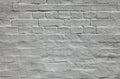 Grey wall, texture, background. The building wall, painted with whiting. Wavy and bumpy surface Royalty Free Stock Photo