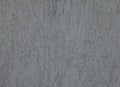 Grey wall, texture, background. Nondescript and darkened building wall. Plastered decorated surface Royalty Free Stock Photo