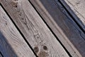 grey weathered wood planks of a boardwalk in diagonal view Royalty Free Stock Photo