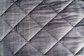 Grey weighted blanket texture detail, heavy relaxing bed sheet