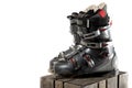 Grey well worn ski boots on a wooden crate Royalty Free Stock Photo