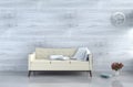 Grey-White living room decor with cream-white sofa Royalty Free Stock Photo